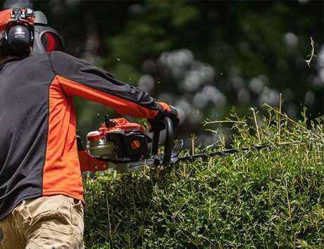 Echo HC-2020 double-sided petrol hedge trimmer, in use